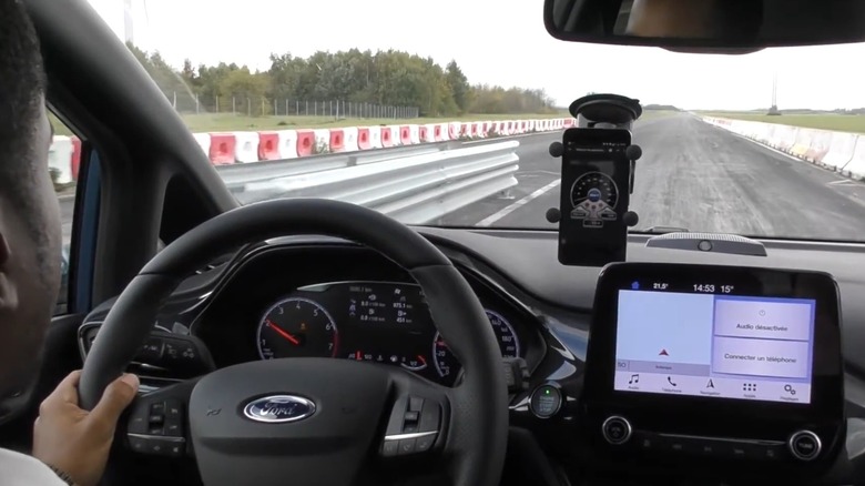 Interior view of Ford Focus on drag strip during measurement test