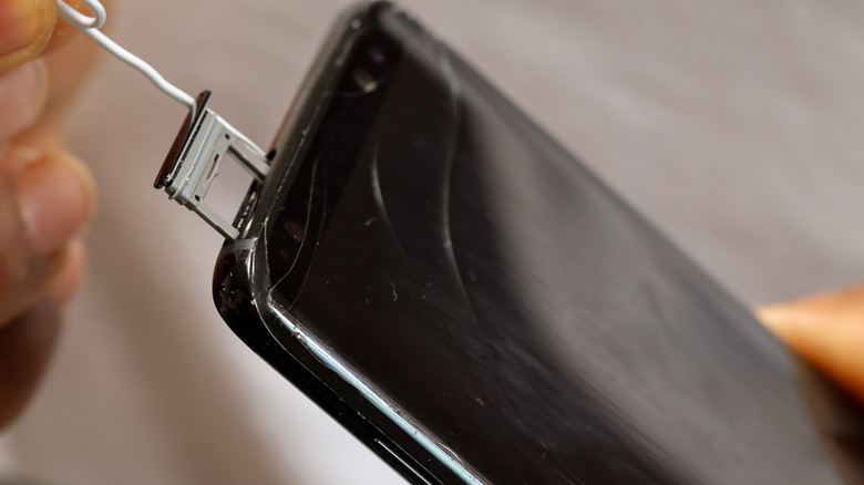 paperclip removing sim slot