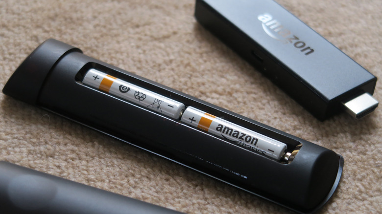 fire tv stick and remote with battery cover removed
