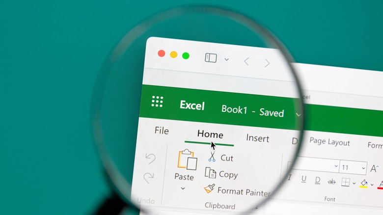 Magnifying glass over Microsoft Excel menu