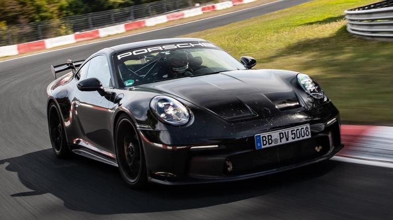 Front 3/4 view of Porsche 911 GT3 shod with Michelin Pilot Sport Cup 2 R tires lapping the Nürburgring track