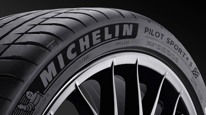 Front 3/4 view of Michelin Pilot Sport 4S tire mounted on alloy wheel in studio setting