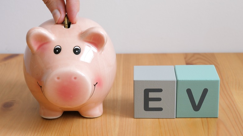 piggy bank with alphabet blocks