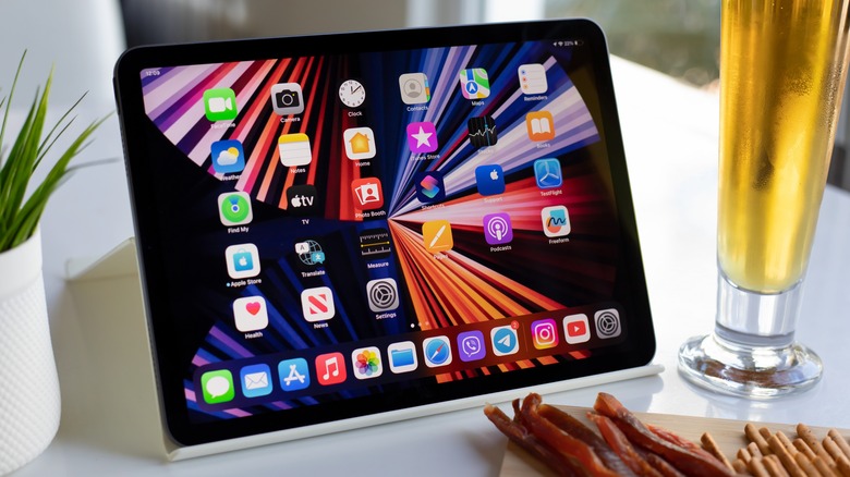 iPad sitting next to snacks