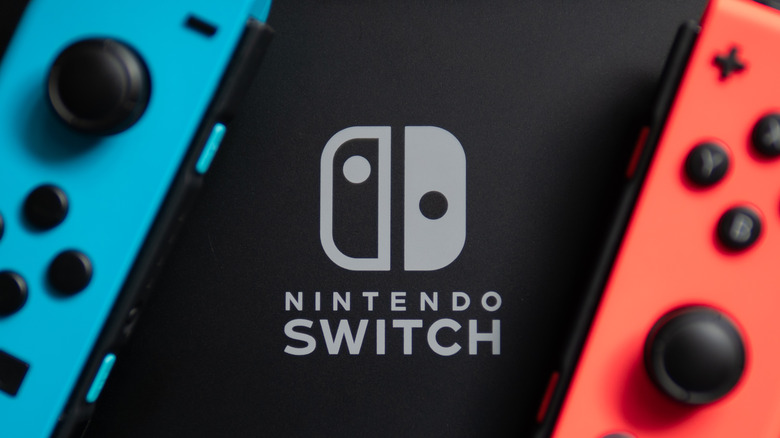 nintendo switch logo with joy-con