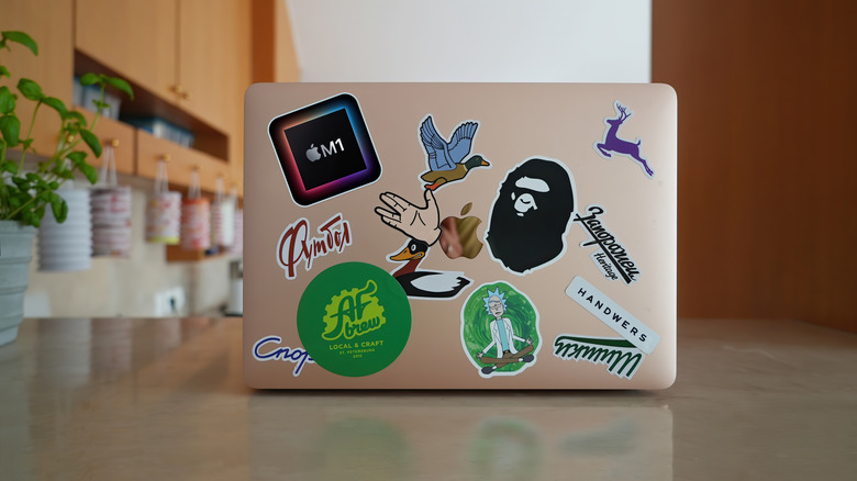 MacBook covered with stickers
