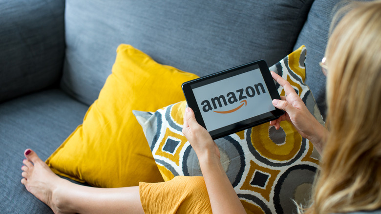 Woman using Amazon on tablet