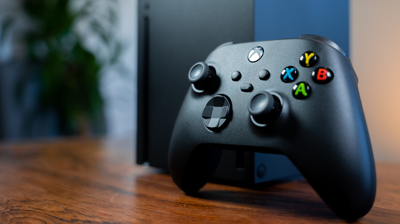 xbox controller leaning on series x