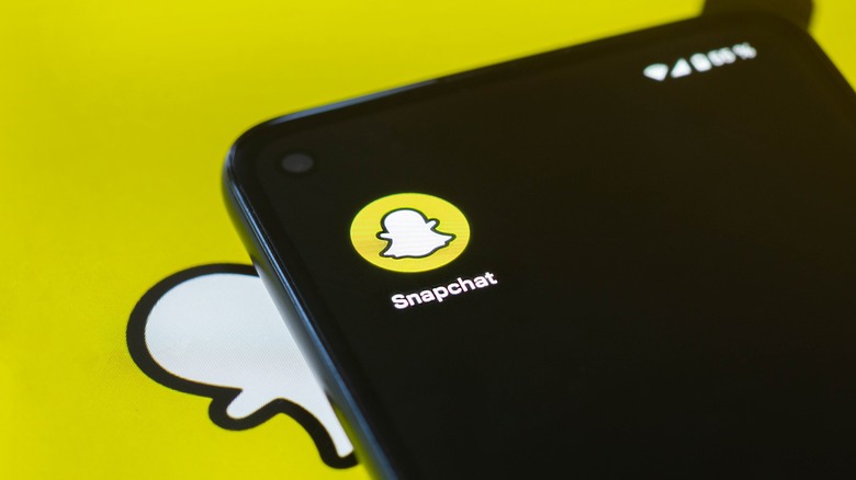 Snapchat logo on smartphone screen