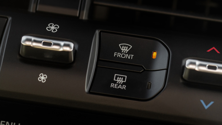 Windshield defrost button