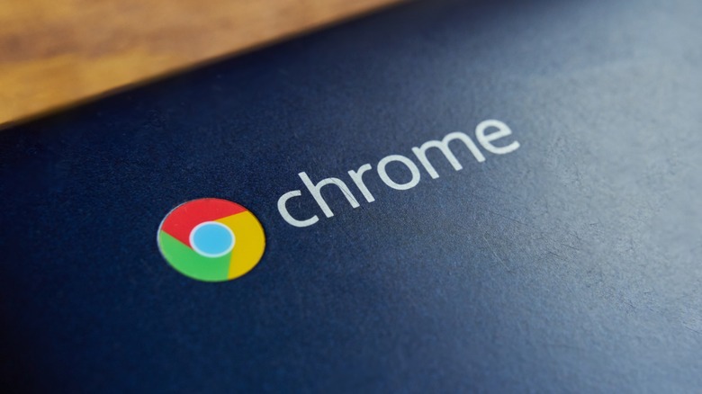 Google Chrome logo on a blue shiny surface