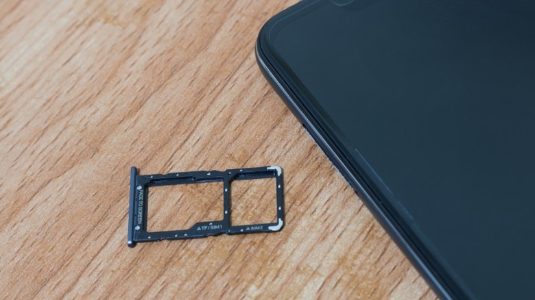 Phone with a SIM and SD card tray