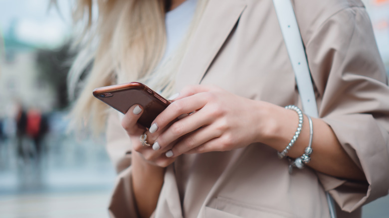 woman holding iPhone 6