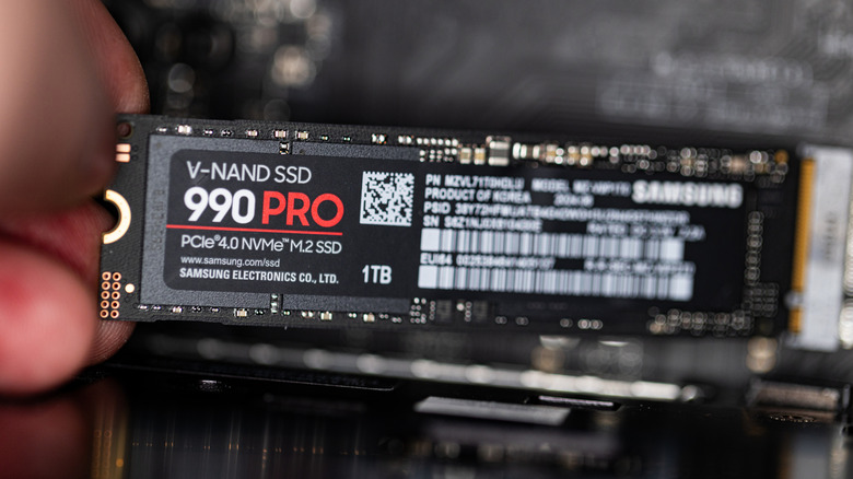 Samsung SSD 990 PRO PCle 4.0 NVMe M.2 on motherboard background