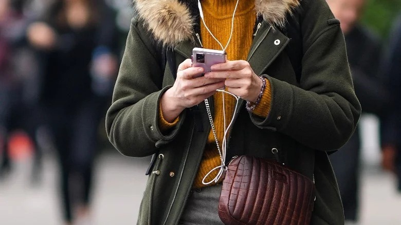 Woman texting in public