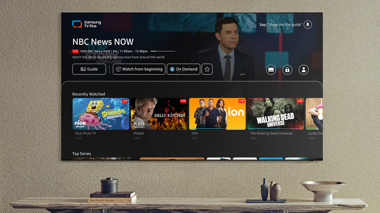 Samsung TV on a wall showing Samsung TV Plus app