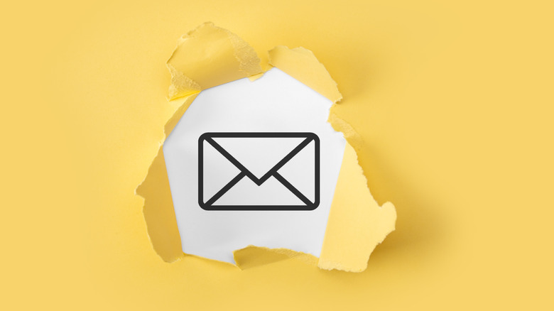 mail icon under yellow paper