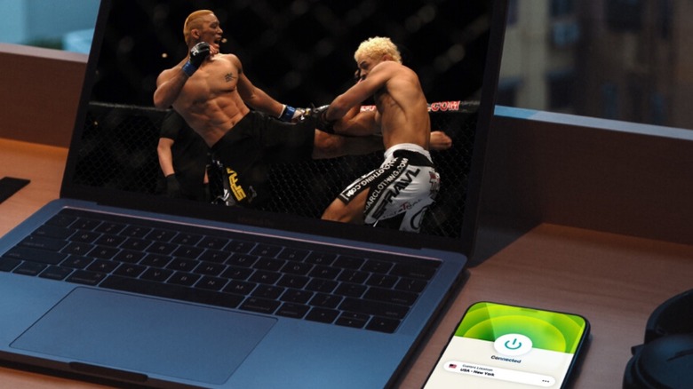 ExpressVPN on mobile while laptop streams UFC fight