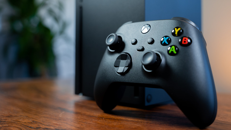 Xbox Series X controller closeup with console