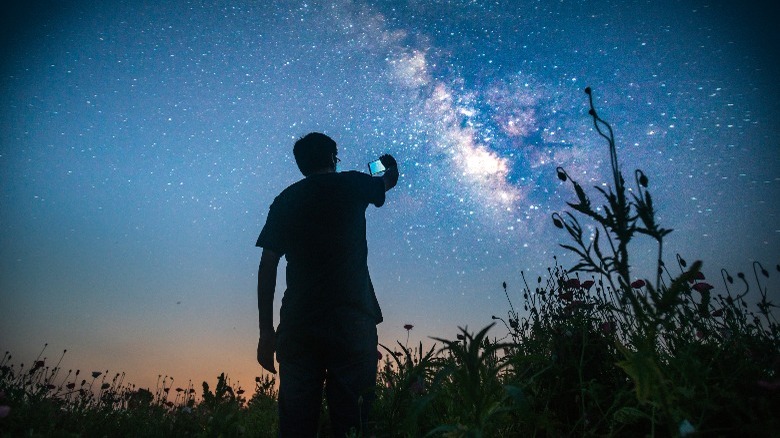 Man capturing the night sky