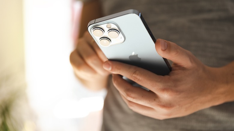 Person holding an iPhone