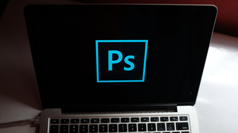 laptop with photoshop logo