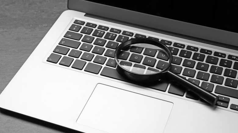 Magnifying glass on MacBook keyboard