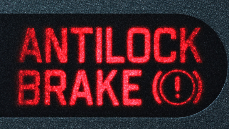 An Anti-Lock Brake sign illuminated on a dashboard
