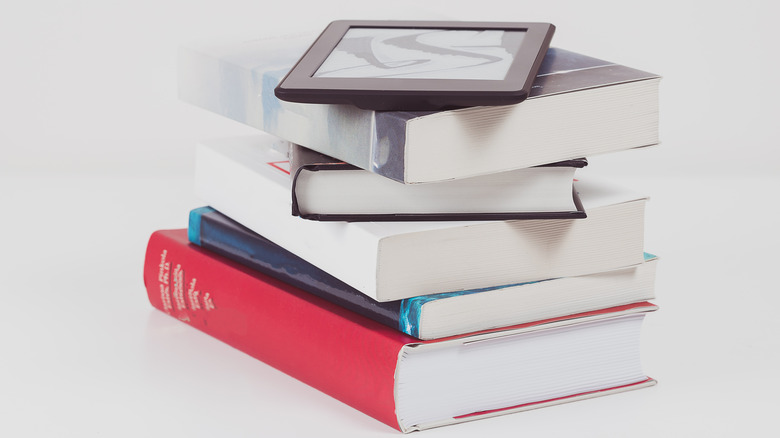 kindle on top of book stack
