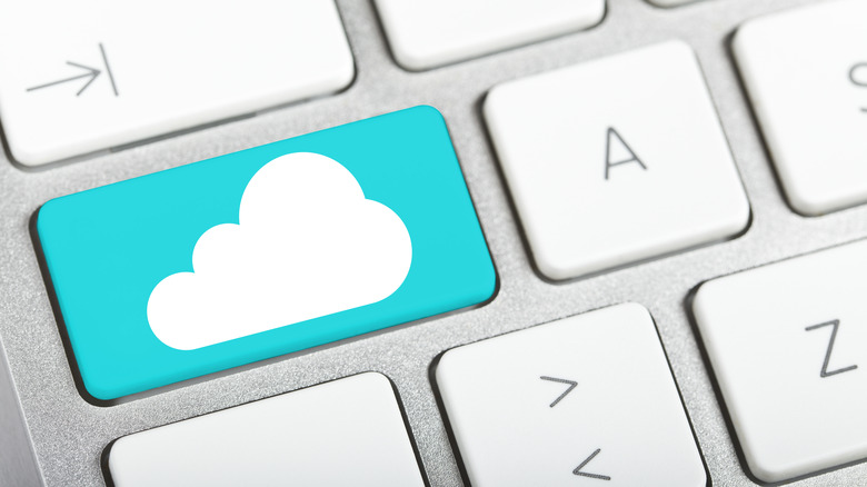cloud logo on MacBook keyboard