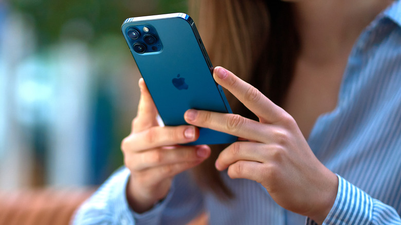 Woman using phone in public