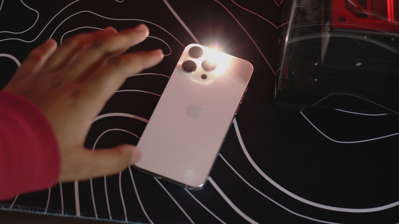 Turning on the iPhone flashlight hands-free