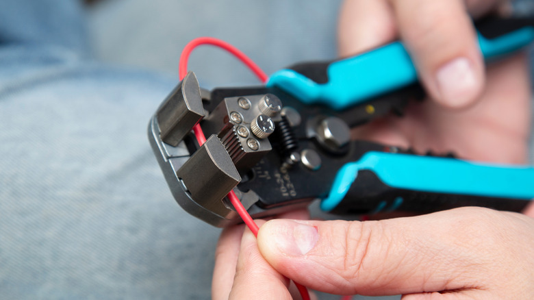 Using wire strippers on red wire