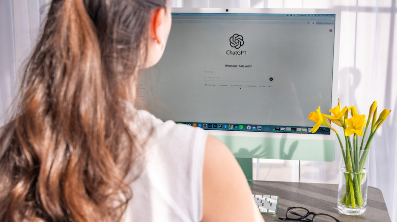 Girl sitting in front of computer