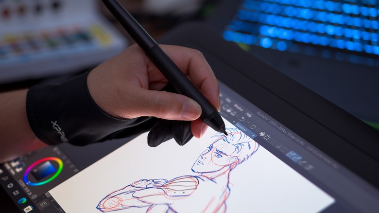 Person using drawing stylus Photoshop