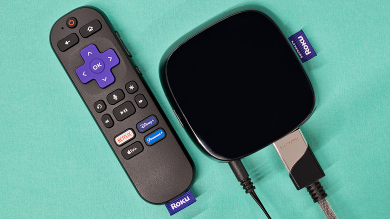 A Roku streaming set top box with remote