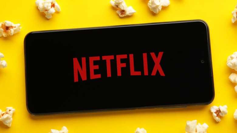 Netflix smartphone logo with popcorn