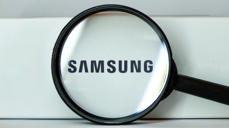 Samsung logo under magnifying glass