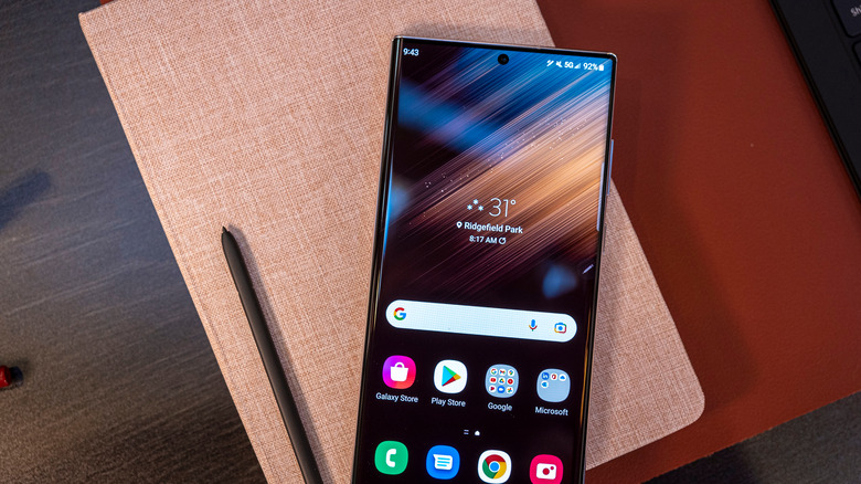 samsung phone on a notebook