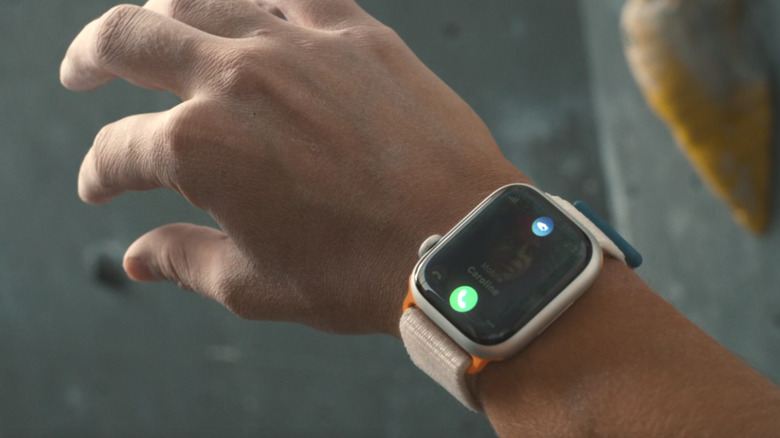 Apple Watch on wrist showcasing the double tap gesture