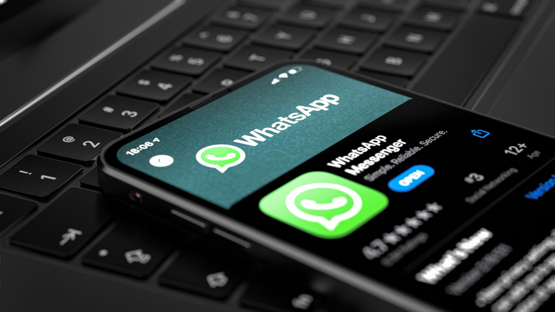 whatsapp mobile phone on keyboard