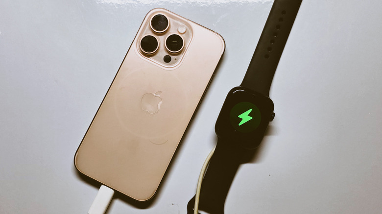 Charging an Apple Watch with iPhone.