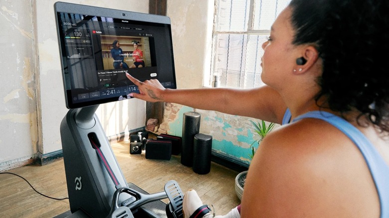 Person using YouTube on Peloton