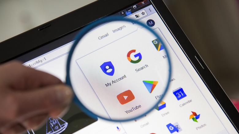 Google services laptop magnifying glass