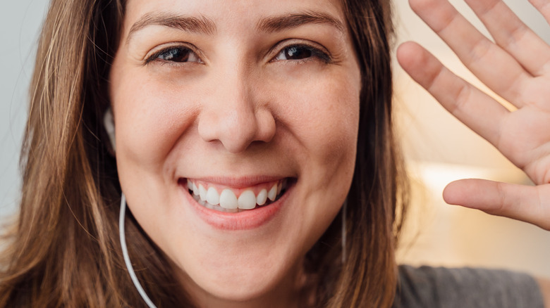 Person FaceTiming with headphones