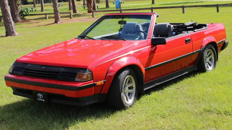 1985 Toyota Celica convertible parked grass
