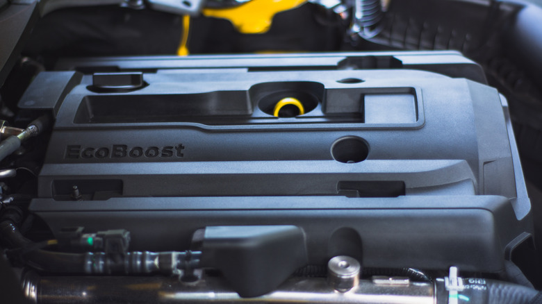 Close-up view of Ford Mustang EcoBoost engine cover.