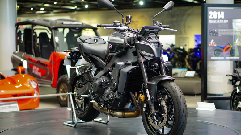 A Yamaha MT-09 motorcycle, the latest model of that year.