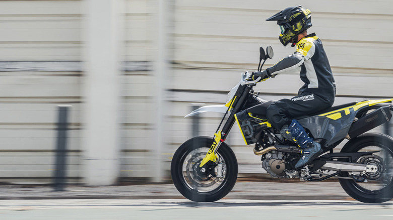 person riding husqvarna supermoto 701