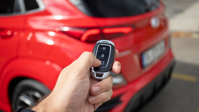 Person holding Hyundai key fob